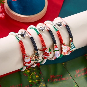 Adjustable Christmas woven bracelets with Santa, tree, and snowman charms for couples