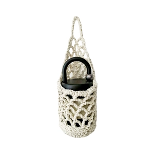 Handmade crochet cotton water bottle carrier with hollow mesh and black matte flask
