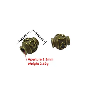 Detailed view of antique bronze barrel beads, 10mm size with 3.5mm hole for DIY jewelry