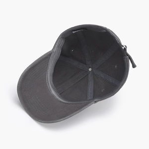 Internal view of washed cotton baseball cap showing six-panel structure and metal buckle