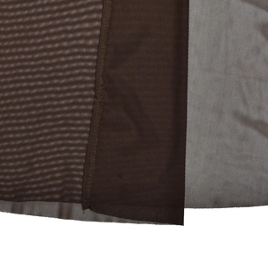 Macro shot of dark brown sheer mesh fabric texture with high-quality stitched hem detail