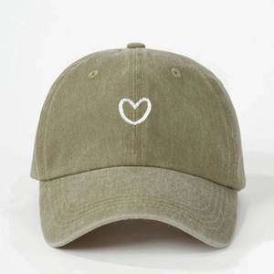 Adjustable olive green washed cotton baseball cap with white embroidered heart outline