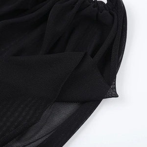 Close-up of black breathable mesh fabric detail on an off-shoulder slim top