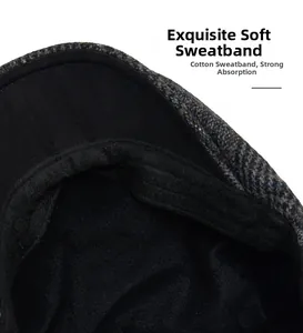 Detail of wool herringbone newsboy cap featuring a soft moisture-wicking cotton sweatband
