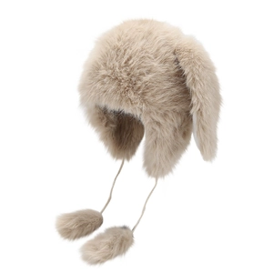 Winter thermal trapper hat with cute long rabbit ears and pom-pom ties in beige faux fur