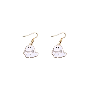 Detail shot of cute cartoon ghost earrings with white oil drip finish and gold edges