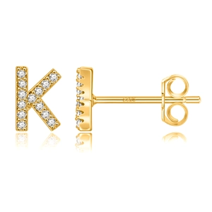 Macro shot of S925 hallmark on a gold-plated letter K stud earring with white stones