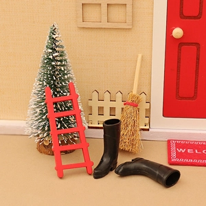 Miniature Christmas dollhouse entrance set with red door, ladder and tiny holiday decor
