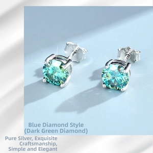 Macro detail of silver four-prong stud earrings with blue moissanite and S925 stamp