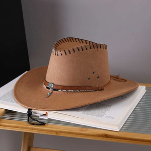 Brown wool felt western cowboy hat with decorative turquoise buckle and feather pendant