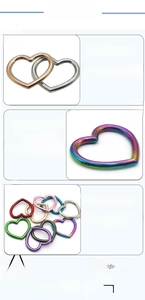 Close-up of colorful heart-shaped alloy metal rings and buckles for DIY accessory decor