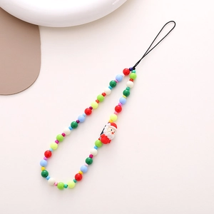 Christmas beaded phone charm with Santa Claus pendant on a minimalist white background