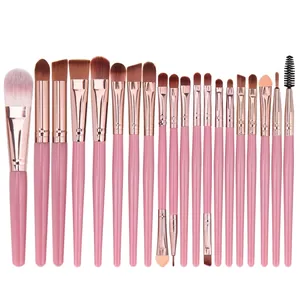 Detailed close-up of 20-piece makeup brush set with pink glitter handles and rose gold ferrules