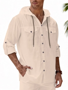 Detailed texture of men's linen hooded beach shirt with buttons and chest pockets