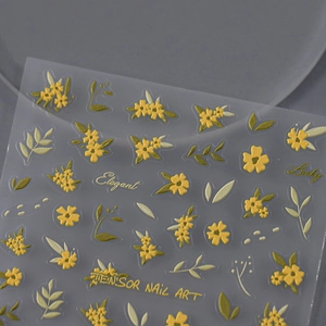 3D relief nail stickers featuring yellow flowers and green leaves with elegant text