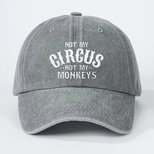 Detail of grey washed cotton baseball cap featuring Not My Circus Not My Monkeys print