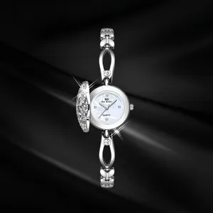 Luxury silver jewelry watch with camellia flip cover and sparkling rhinestones for women