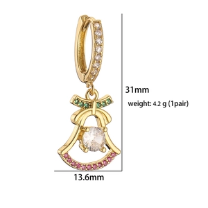 Detailed view of gold Christmas bell earrings with red and green stones, size 31mm by 13.6mm