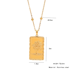 Detail of golden stainless steel palm tree pendant with dimensions and product specs