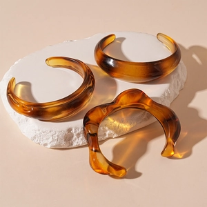 Amber acrylic irregular cuff bracelet set with vintage tortoiseshell texture on stone