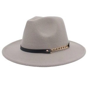 Detailed view of gray fedora with black leather band and gold metal chain accent