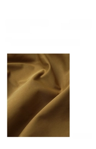 Detail shot of the premium thick fabric with heavy-duty twill texture for work aprons