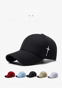 Close-up of side cross embroidery on cotton baseball caps available in five diverse colors