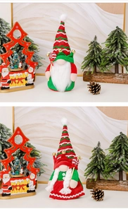 Detail of plush Christmas gnomes with striped hats and candy canes for festive decoration