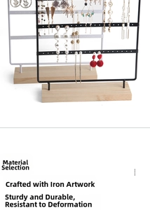 Detailed view of a 5-tier jewelry organizer with black and white metal racks on wood base