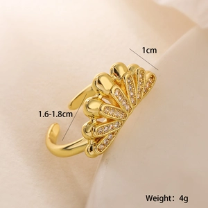 Macro shot of 18K gold plated fan-shaped ring with zircon, showing 1cm height and 4g weight