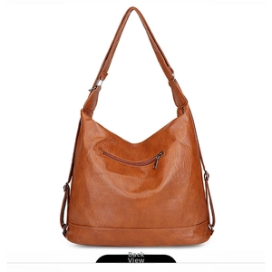 Back view of brown hobo bag with a zipper pocket and adjustable shoulder strap