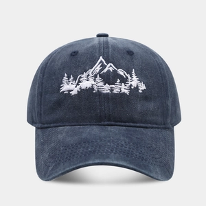 Navy blue washed cotton baseball cap with white mountain and forest embroidery