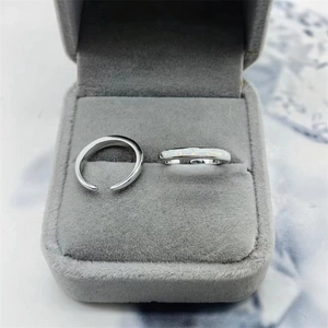 Close-up of S925 sterling silver opal open toe rings set in a velvet jewelry box