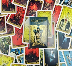 Macro view of Fabio Listrani Night Sun Tarot cards set with boxes and mystical illustrations