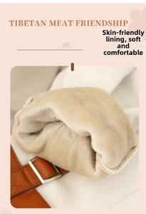 Detail of warm faux suede gloves showing thick camel fleece lining and leather metal buckle