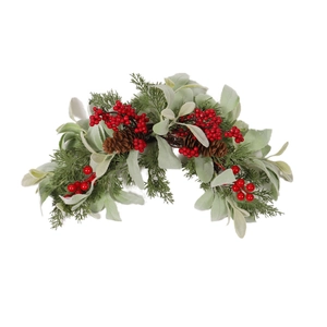 Artificial Christmas swag with red berries pine cones and flocked silver leaf foliage