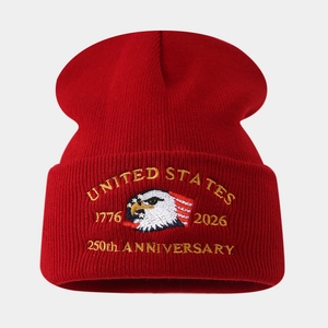 Red knit beanie with US 250th anniversary eagle embroidery and ribbed texture design