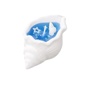 Artistic ocean theme conch shell scented candle with blue jelly wax and starfish decor