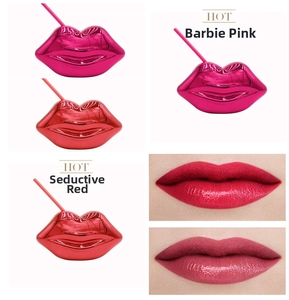 Close-up of Barbie pink and charming red lip-shaped disco cups with matching straws