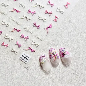 3D embossed nail art stickers with pink and white bow designs for Japanese style manicure