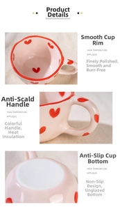 Detail view of pink ceramic mug with red hearts showing non-slip base and heat-proof handle