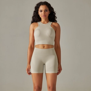 Close-up of seamless two-piece yoga set featuring high-waisted shorts and ribbed fabric