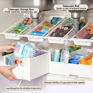 Adjustable kitchen sink storage rack with white bins and telescopic rods for cabinets