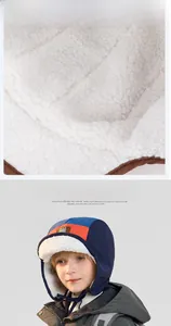 Close-up of thick plush lining and thermal earmuffs on a kids winter trapper hat