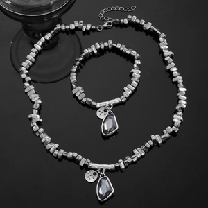 Ensemble collier et bracelet cœur en perles d'argent avec pierres de cristal gris