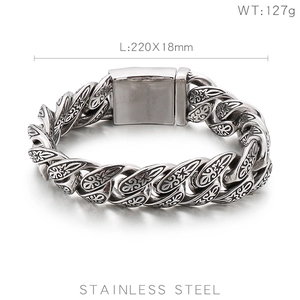 Detailed view of the intricate engraved patterns on this retro men's 316L steel bracelet