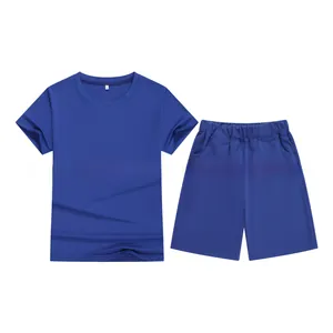 Detail of dark blue kids sports set showing t-shirt and elastic shorts flat lay
