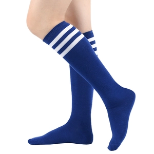 Detail showing the blue striped knee high socks with white athletic bands on the knit fabric