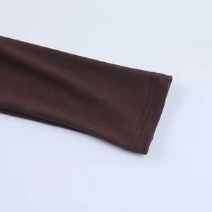 Detailed close-up of dark brown sleeve cuffs showing fine knit fabric and stitching