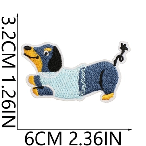 Detailed size view of cartoon dachshund embroidery patch in blue and yellow colors